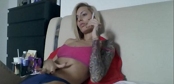  cam girl smoking and playing with her sexy tits alone